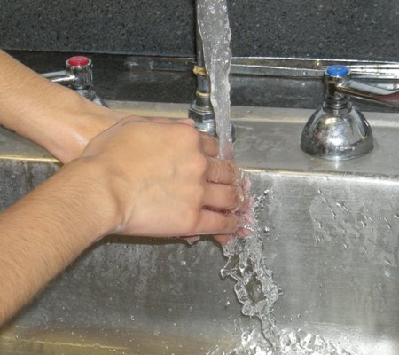 hand washing in sink