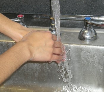 hand washing in sink