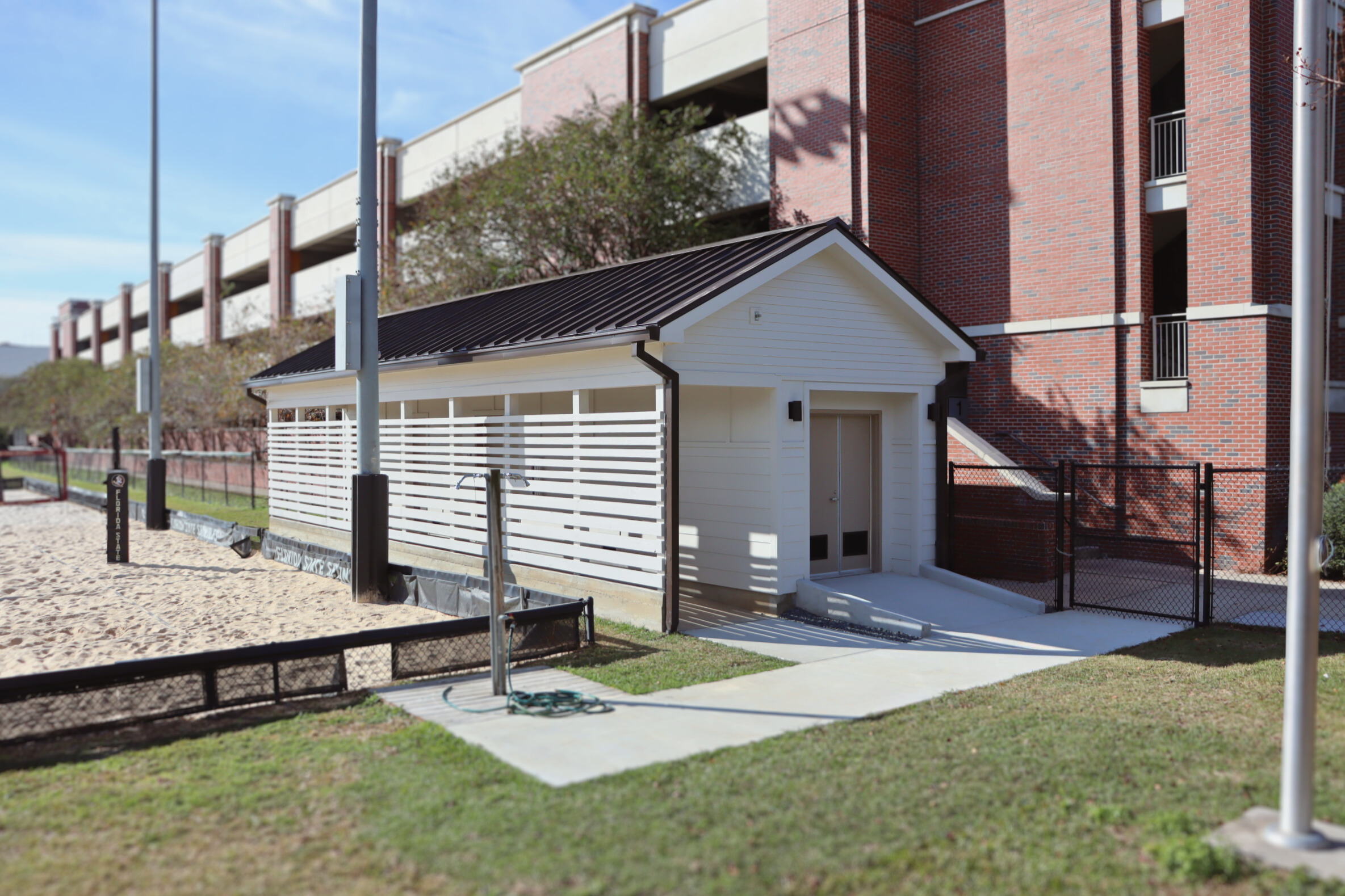 New beach volleyball storage and restroom facility